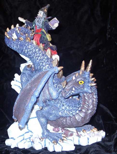 Bookend Dragon with Wizard - Just the right height to be a bookend for hardcover books.