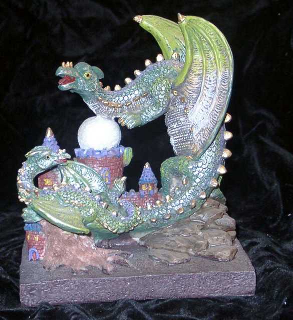 Bookend Dragon and Dragonette - Parent and child and their castle. Just right for a paperback book bookend.