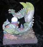 Bookend Dragon and Dragonette - Parent and child and their castle. Just right for a paperback book bookend.