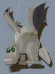 Flapper - Wooden dragon that flaps and hangs from a spring.
